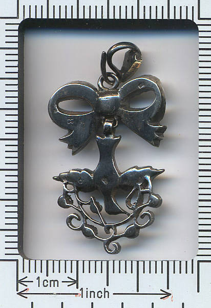 SILVER SAINT ESPRIT & BOW PENDANT